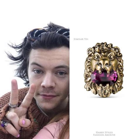 harry styles gucci lion ring.